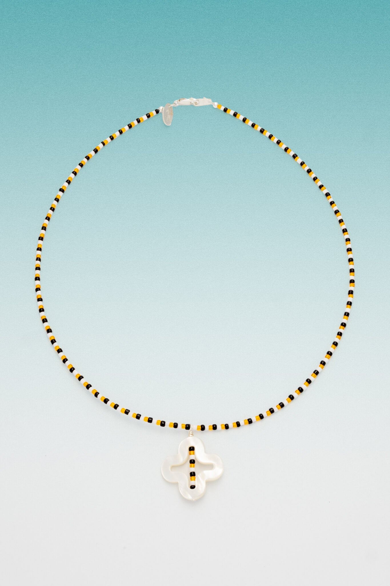 B213_Suma Necklace - MOP Cross_L_01