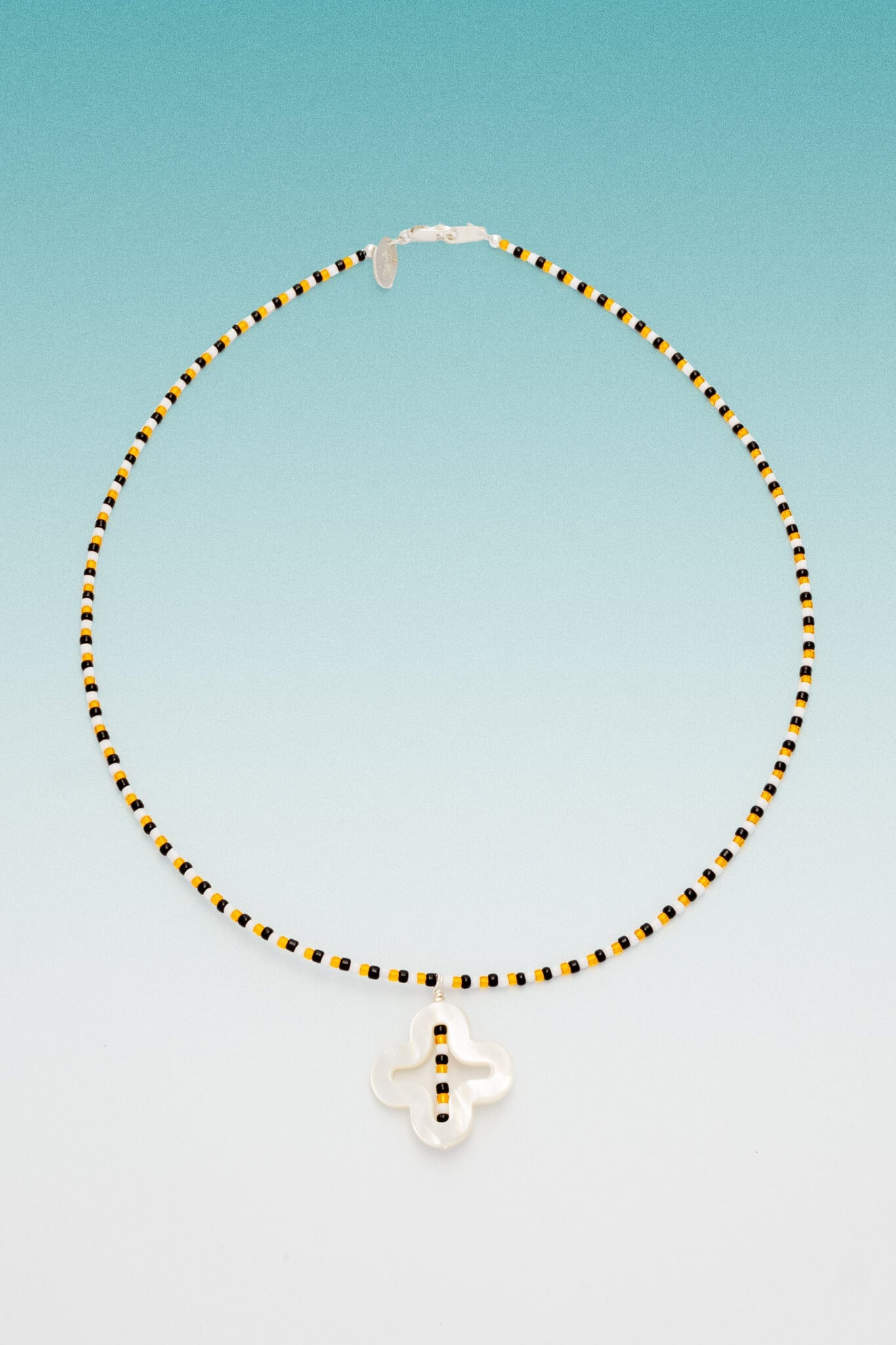 B213_Suma Necklace - MOP Cross_L_01